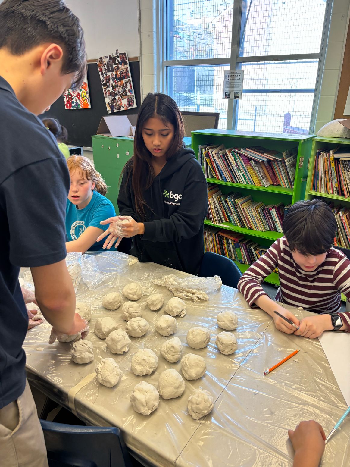 Clay pieces arranged on a workshop table